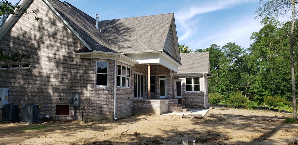 Exterior finishes of The Bluestone Plan 1302. 