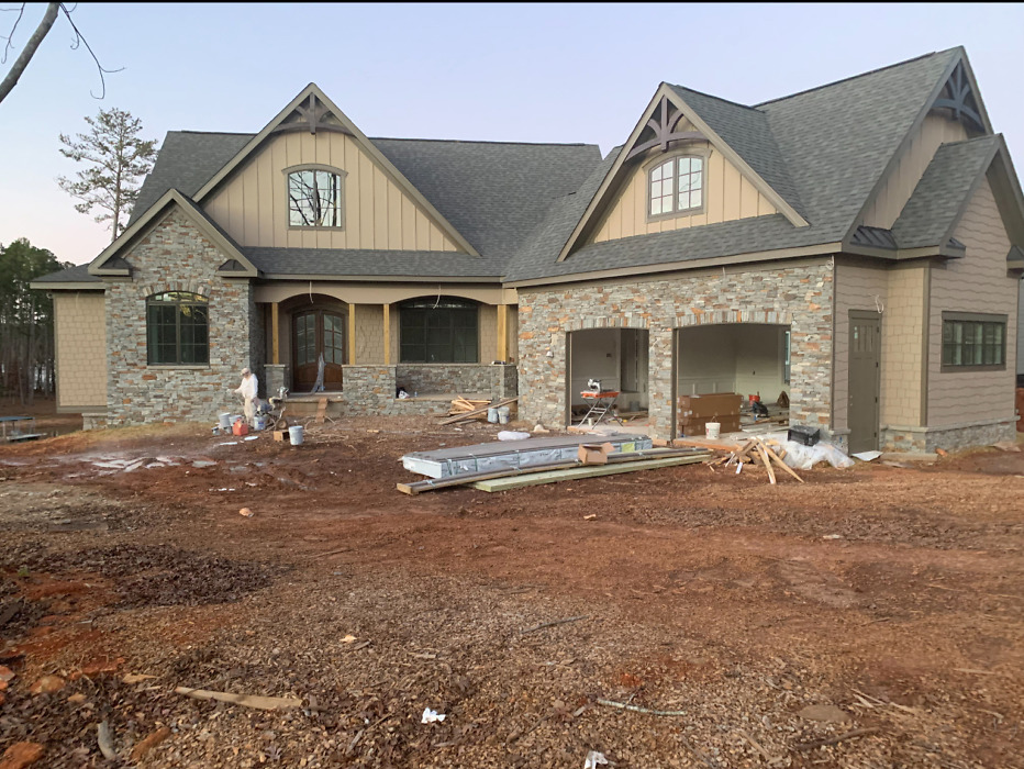 Exterior finishes of The Butler Ridge house plan 1320-D. 